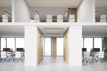 Two storey office with conference rooms and computers