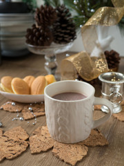 Obraz na płótnie Canvas hot chocolate christmas pinecone butter bread wood background