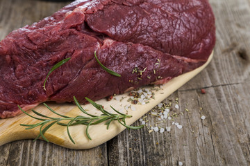Beef Steak on wooden board.