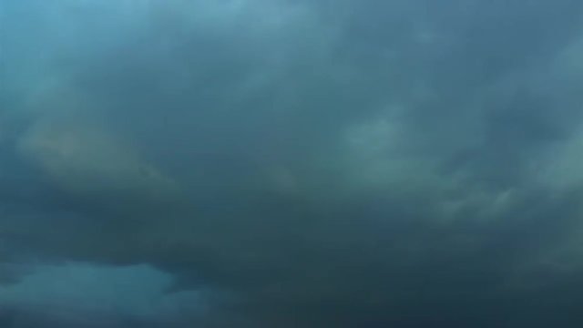 montage of 5 clips with intense lightning bolts in a storm with fast moving clouds