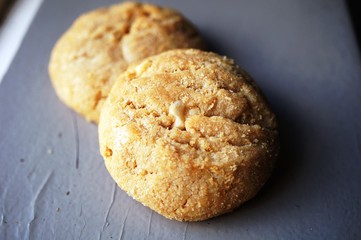 Two round peanut butter cookies