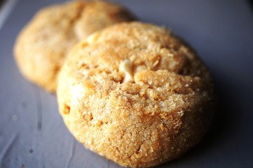 Two round peanut butter cookies
