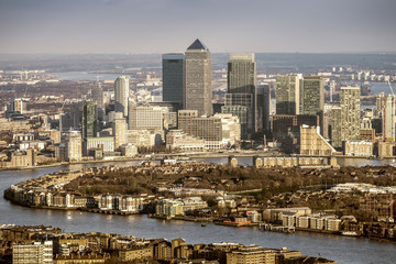 London, England - Aerial view of River Thames and the skyscrapers of Canary Wharf, the leading business district of the world
