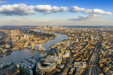 London, England - Panoramic aerial view of London with the famous Tower and Tower Bridge and...