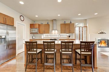 View of four bar stools in modern kitchen room