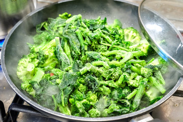 frozen broccoli turnip green cooking vegetable pan