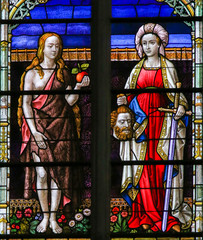 Obraz premium Stained Glass of Eve and Judith