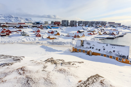 Old harbor and Nuuk city center covered in snow, Greenland