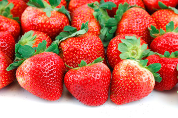 fresh picked strawberries isolated on white background