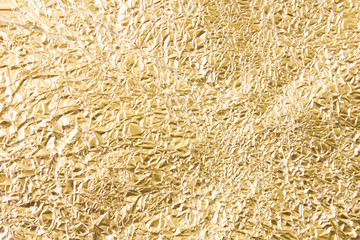 Gold wrinkled paper texture abstract background