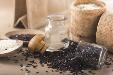 Mixed rice and Rice berry or uncooked brown rice in wooden spoon