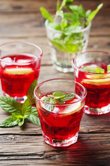 Aperitif with campari, mint and lemon