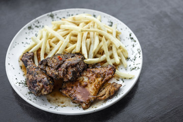 portuguese famous piri piri spicy bbq chicken with french fries