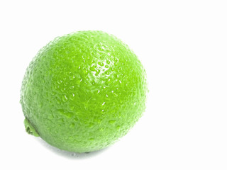 Fresh Tahiti lemon with water drop isolated over white