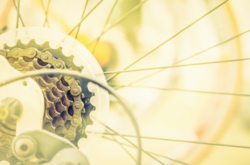 Warm vintage style photo of close up bicycle gear