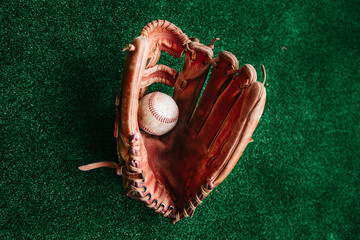 baseball glove, baseball cap, ball.