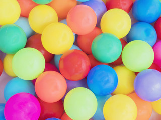Colorful plastic toy balls background