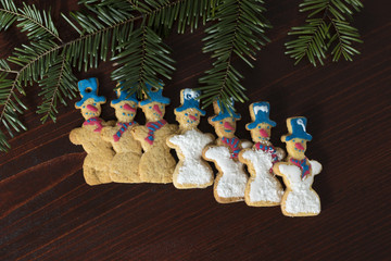 Group of Gingerbread snowman  on a wooden table