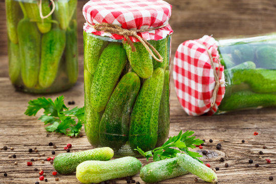 Homemade pickles in brine, Jar of homemade Pickled Gherkins