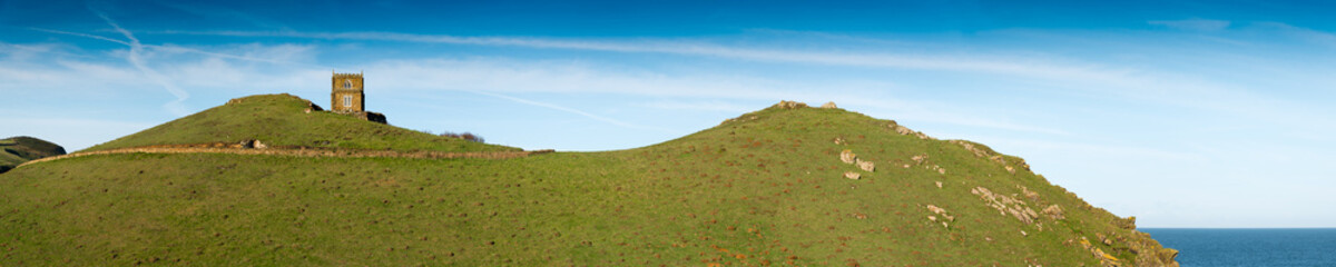 Panoramic view with Doyden Castle near Port Quin in north Cornwall. Picture taken from a public footpath.