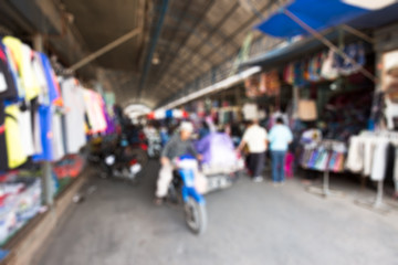 Blurred photo of clothes Shopping center and people background