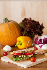 Sandwich with grilled chicken and tomatoes