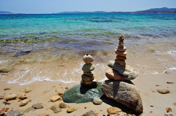 Piled stones on the shore
