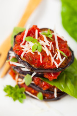 Layered Italian Eggplant Appetizer on White Background. Selective focus.