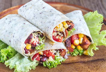 Four chicken burritos