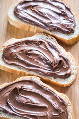 Slices of baguette with chocolate cream