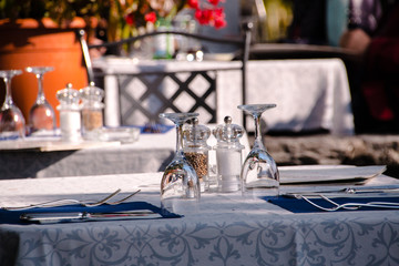 Covered table outside in on a terrace in a restaurant