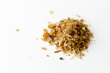 Close-up of natural aromatic incense musk isolated on a white backgroundon Arab environment