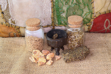 Set of natural incense with musk, benzoin resin, sandalwood and Patchouli with copper censer on...