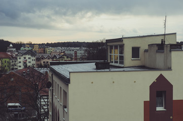 Storm dark clouds over city