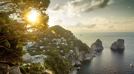 Panoramic view on Faraglioni rocks from Capri island, Italy