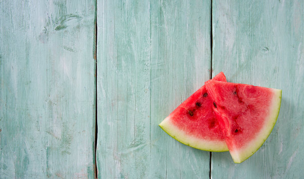 Freshly Cut Water Melon On Wooden Table