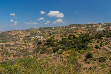 Fototapeta na wymiar Agia Irini, Greece. July 27. 2016: Panoramic view to mountains