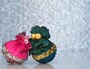 Two beautiful christmas toy on the bokeh background.