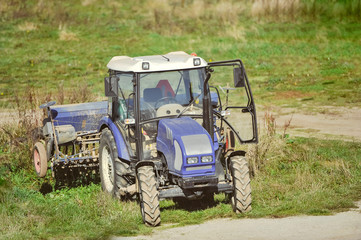 tractor in the field during sowing grain
