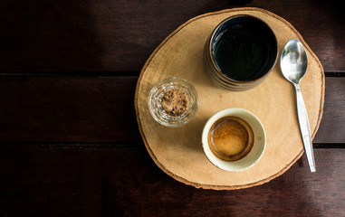 Coffee Espresso and sugar Served on a wooden tray.
