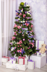 Christmas tree with toys and gifts