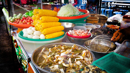 Veggies and fruits, papaya , tomato , corn , mango , salted egg , eggplant , garnish for papaya Salad Shop Popular menu in Thailand.