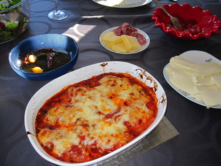 Chicken Parmigiana, provolone, salami, peppers the Italian-American table