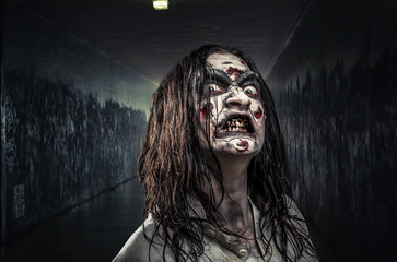 Zombie woman with bloody face
