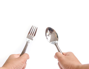 spoon and fork in hands isolated on white background