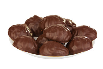 Delicious chocolate marshmallow on plate on white