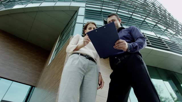 Colleagues discussing a project
