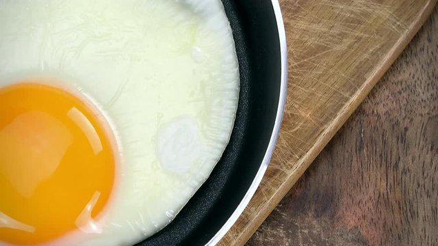 Portion of rotating fried Eggs as not loopable 4K UHD footage