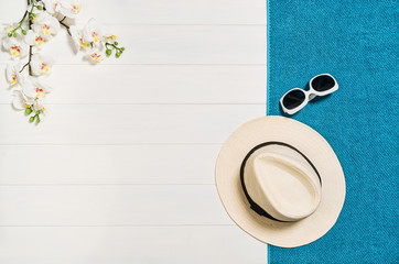 Top view of beach summer accessories with copy space.