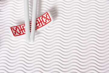 Ceramic chopsticks on White  background
